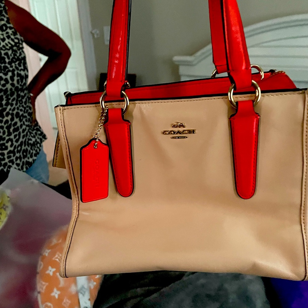Small orange Coach purse
